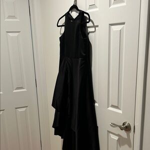 JJs House sleeveless girls formal.  Black satin size 12/14.